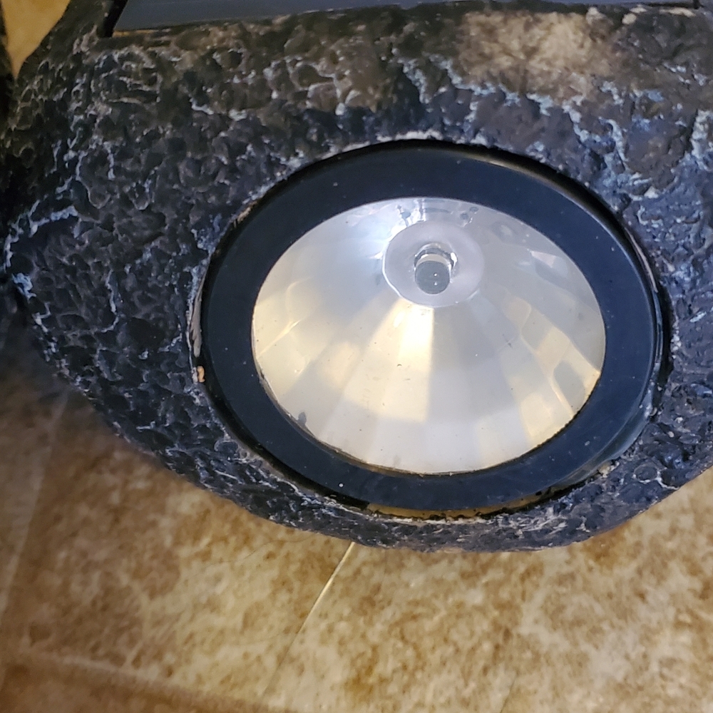 Set of 4 solar lawn lights.